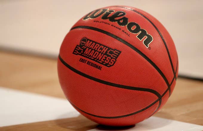 Basketball with NCAA branding.