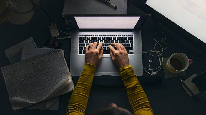 A person is shown working from home.