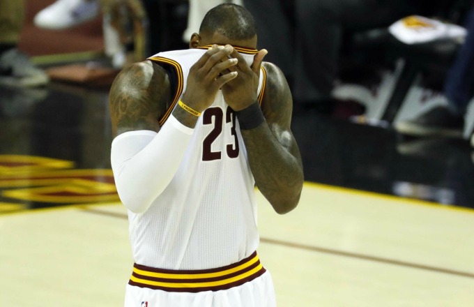 LeBron James shows his frustration on the court against the Celtics.
