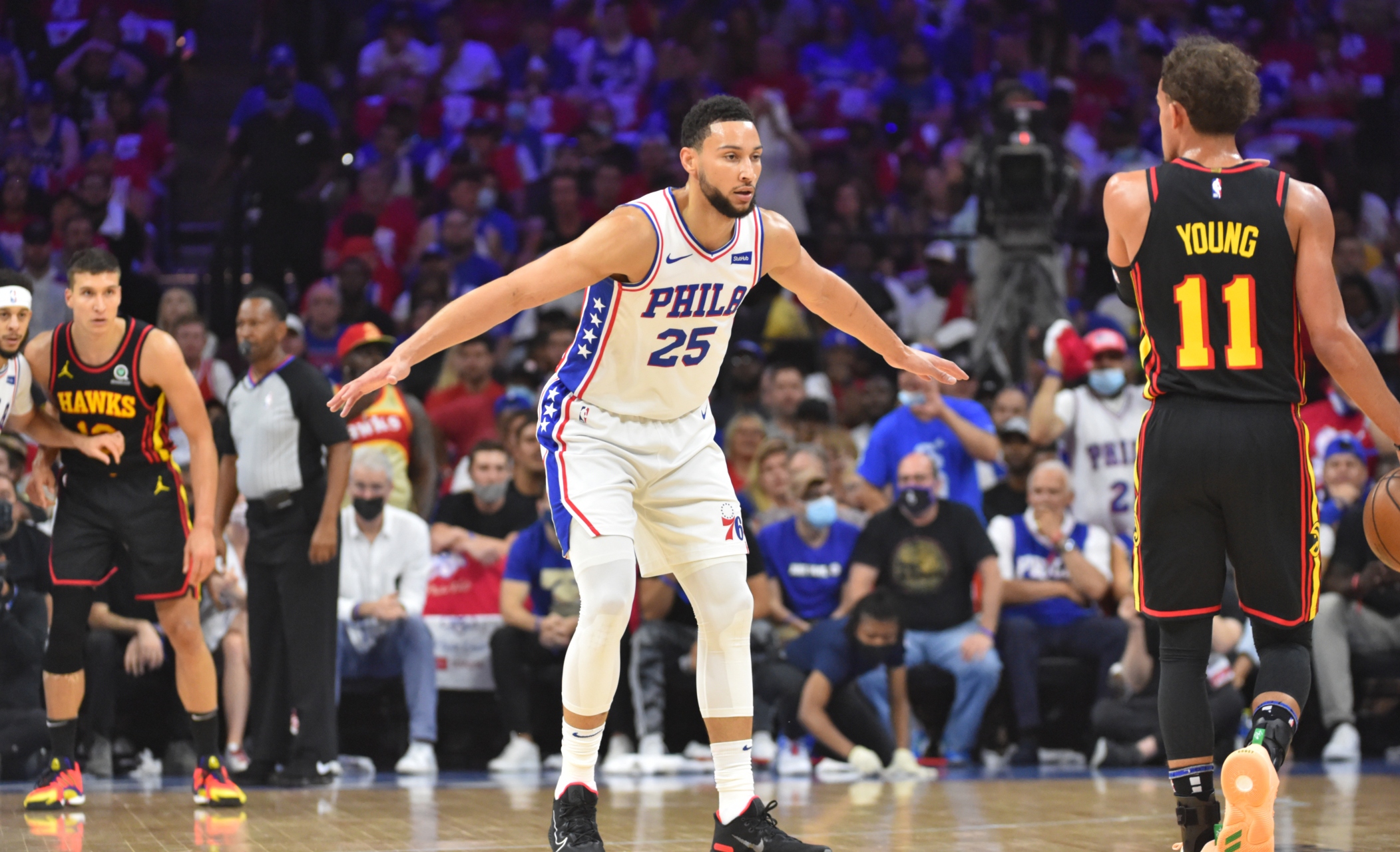 Philadelphia 76ers' Ben Simmons (25) reacts after dunking the ball