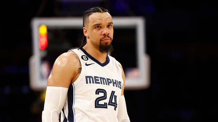 Dillon Brooks looks on during playoff game.