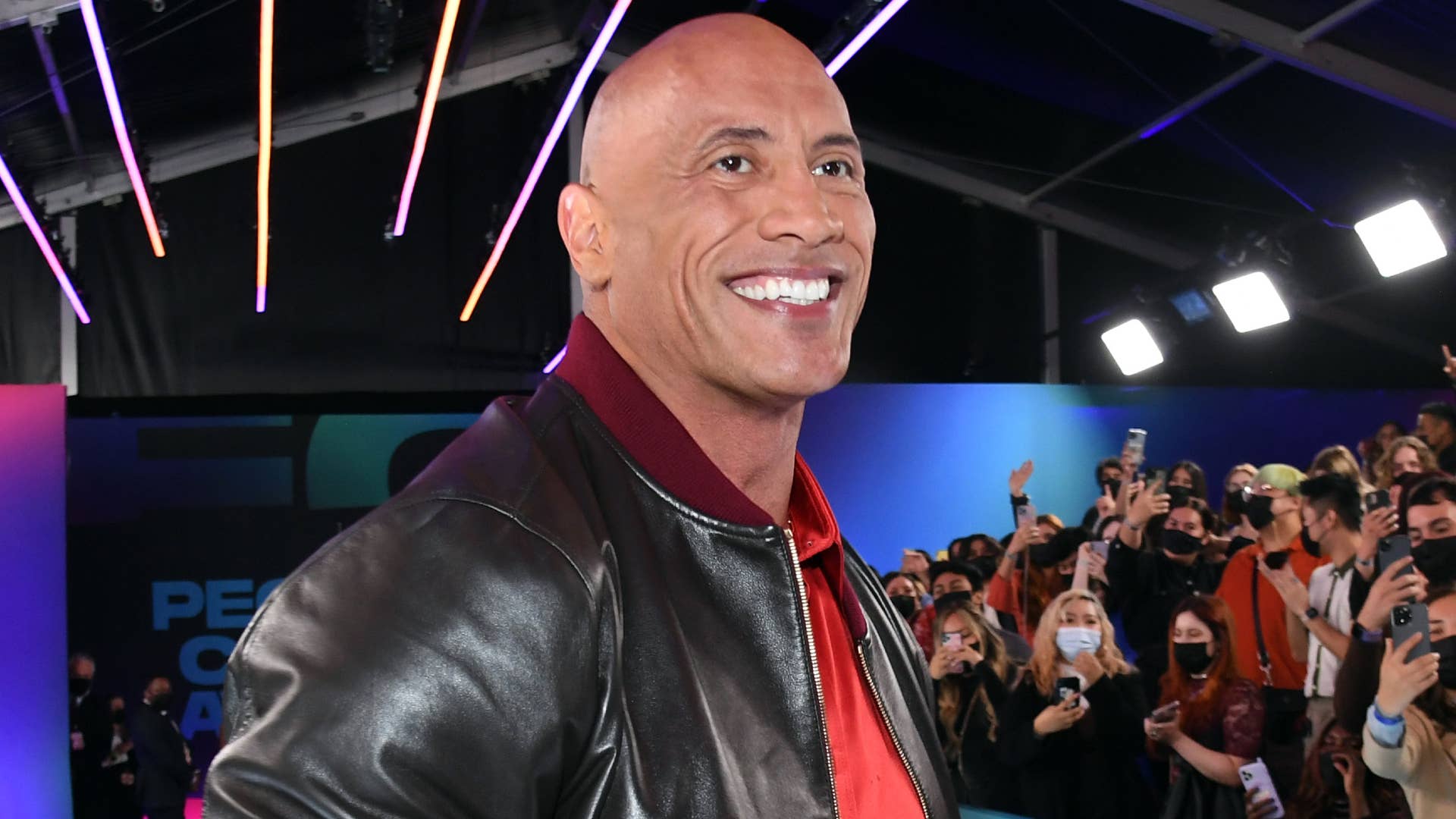 Dwayne Johnson is pictured smiling