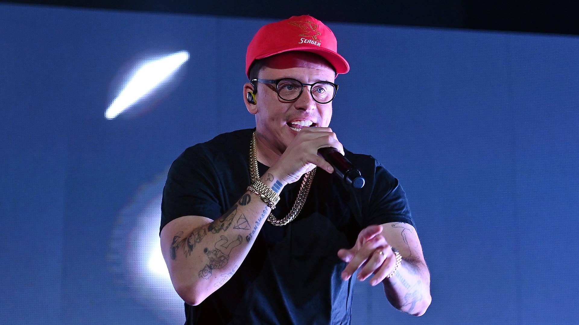 Rapper Logic performs onstage during "Vinyl Verse Summer" tour at Cellairis Amphitheatre at Lakewood
