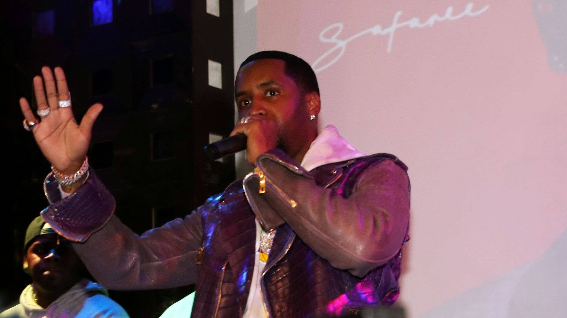 Safaree at a public event talking.