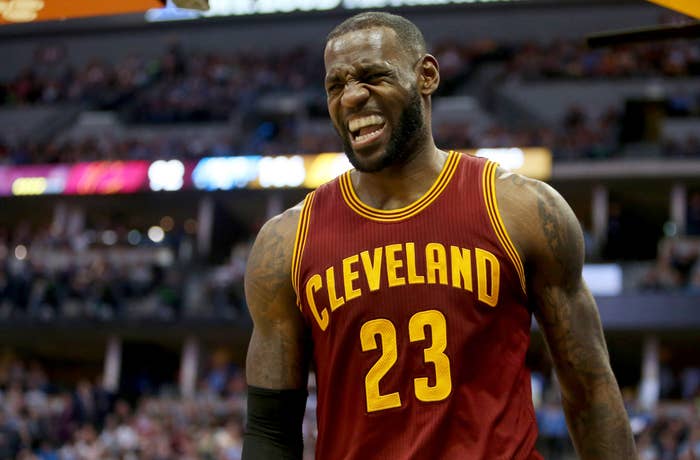 LeBron James grimaces during a game against the Nuggets.