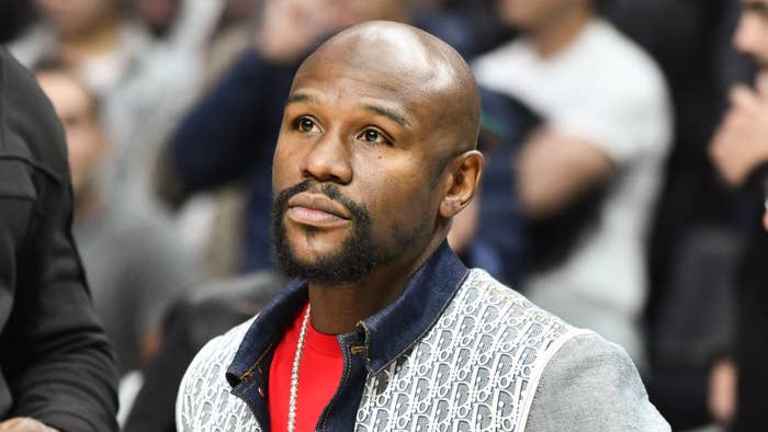 Floyd Mayweather Jr. attends a basketball game