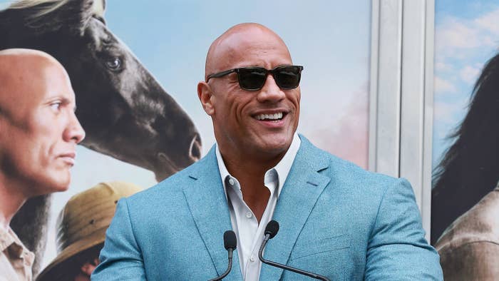 Dwayne Johnson speaks during Hand And Footprint Ceremony honoring Kevin Hart