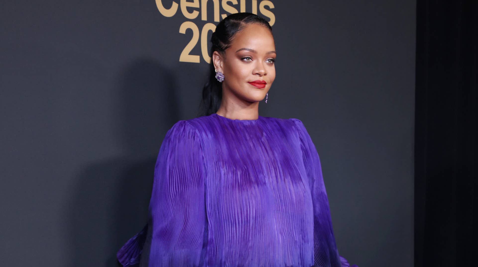 Rihanna poses with the President’s Award