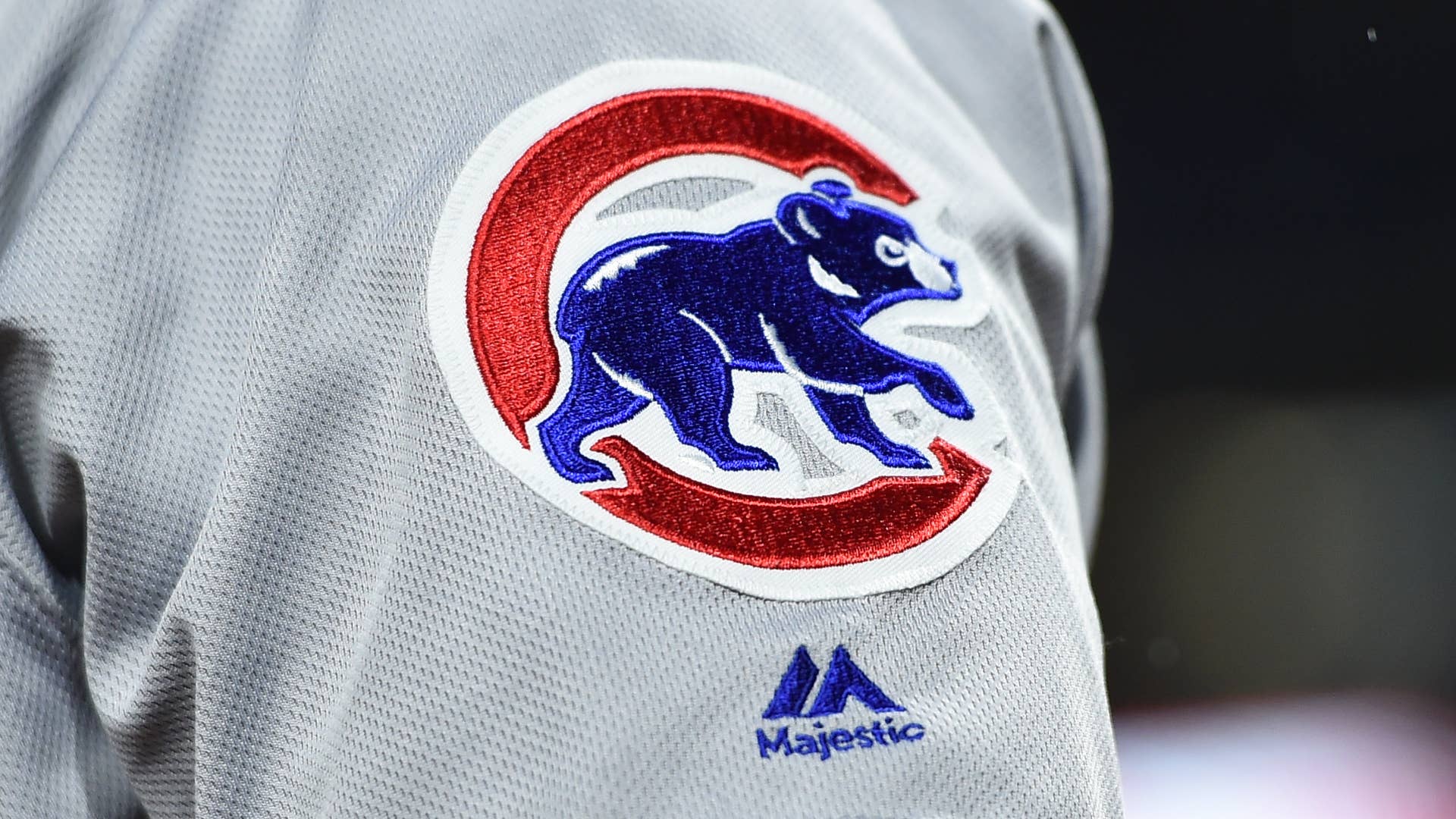 Chicago Cubs logo is displayed on the Majestic jersey.