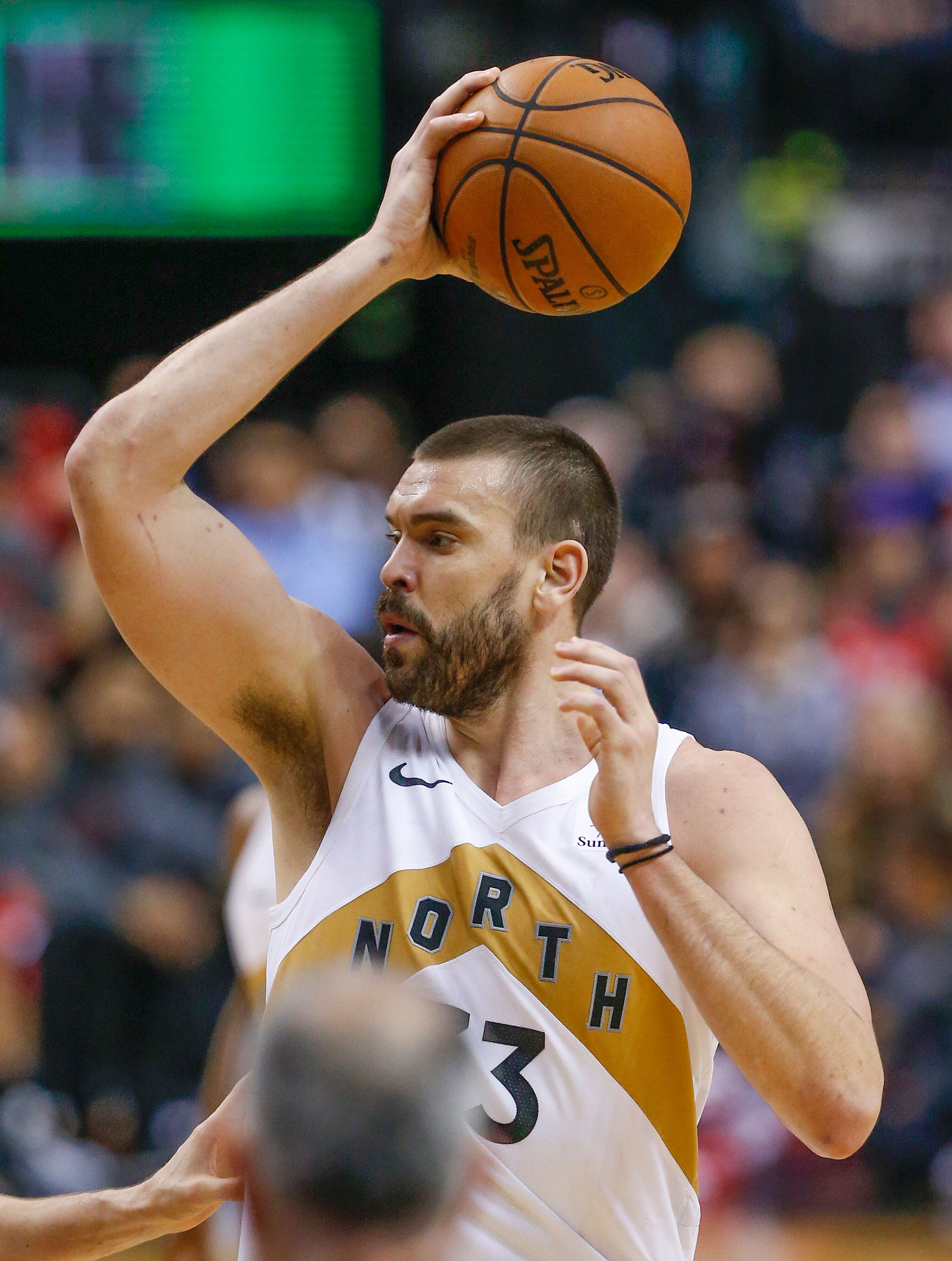 Toronto Raptors center Marc Gasol (33) grasps the ball and looks to pass.