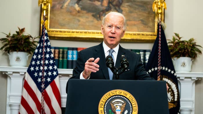 President Joe Biden is pictured at a podium