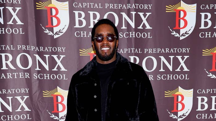 Sean “Diddy” Combs poses for a photo at his Capital Preparatory School