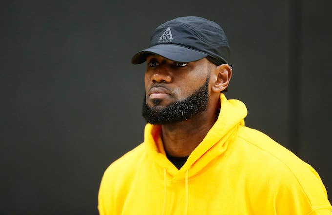 LeBron James watches Lakers' press conference introducing Anthony Davis.