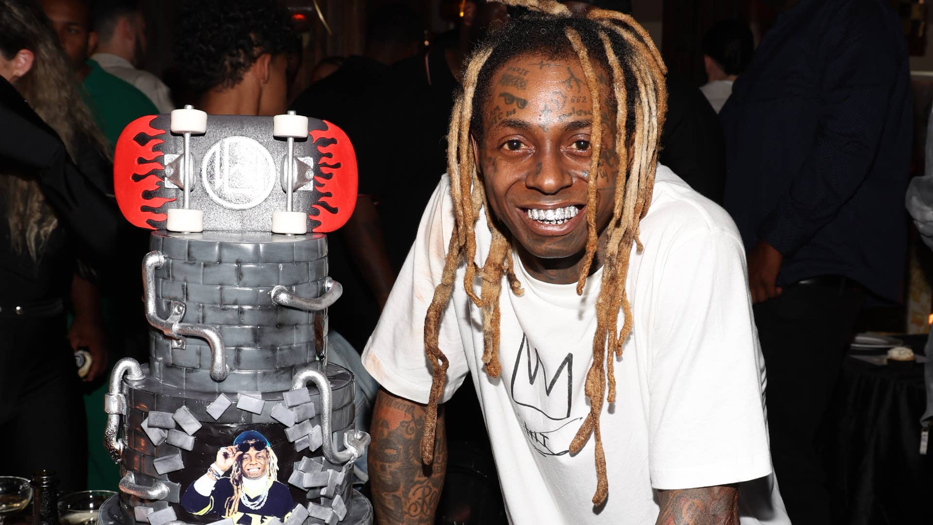 Lil Wayne is pictured at a birthday celebration