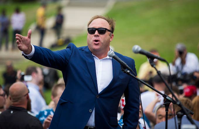 Alex Jones speaks during a rally in support of Donald Trump.