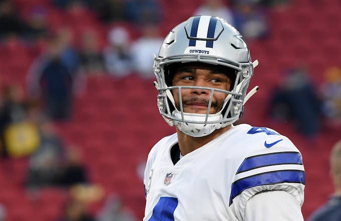Dak Prescott warms up before the NFC Divisional Playoff game against the Los Angeles Rams.