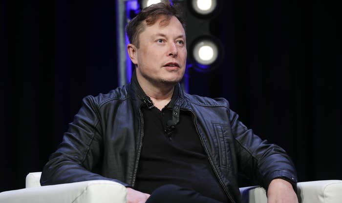 Tesla CEO and founder Elon Musk speaking onstage at a conference