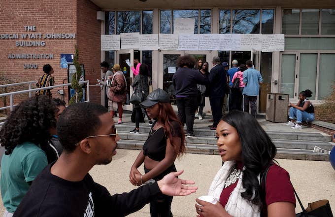 People gather outside the Mordecai Wyatt Johnson Building during a sit in at Howard University.