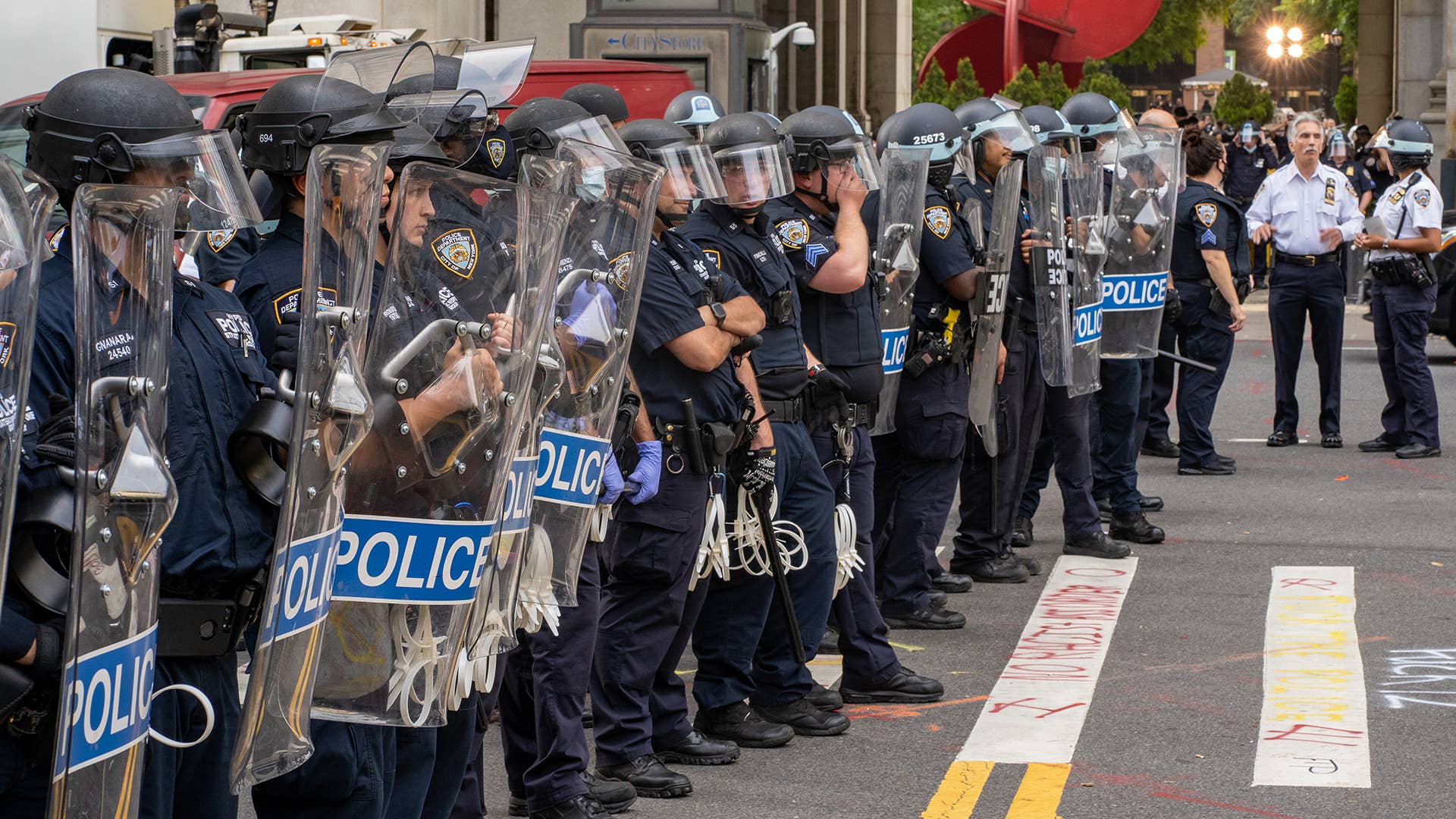 Protesters and police officers clash for the second morning in a row on July 1, 2020 in New York City