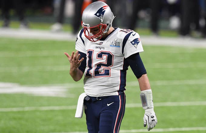 Tom Brady looks at his hand during the Super Bowl.