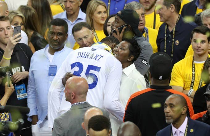 Kevin Durant and his mom celebrate an NBA Finals win.