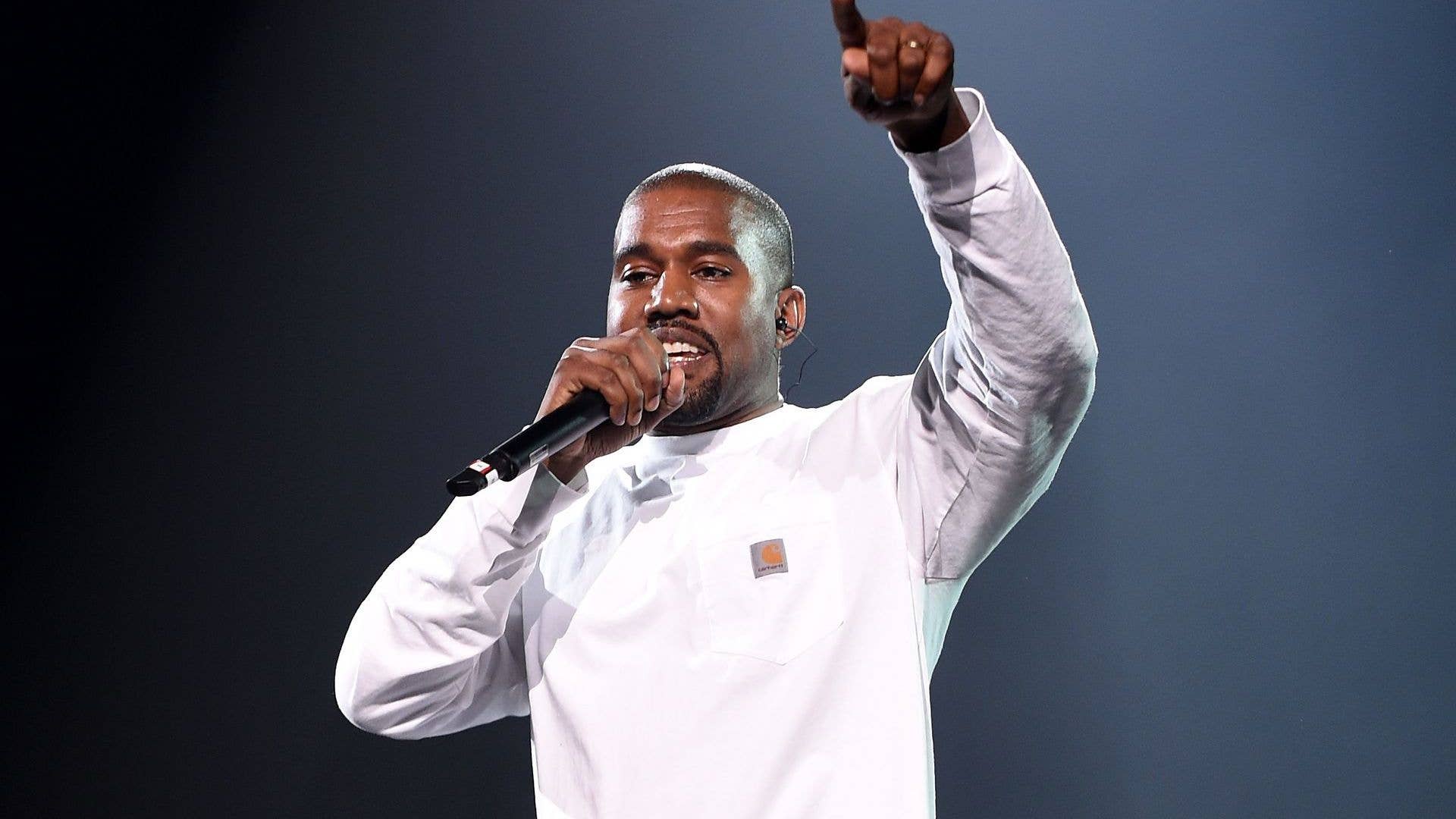 Kanye West performs during Puff Daddy and Bad Boy Family Reunion Tour