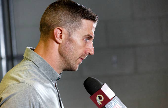 Quarterback Alex Smith #11 of the Washington Redskins addresses the media