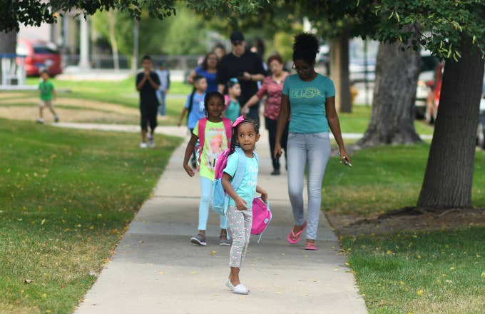 Students walk to school at Greenlee Elementary School