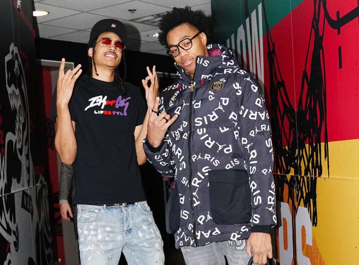 Toronto Raptors rookies Dalano Banton and Scottie Barnes pose in tunnel