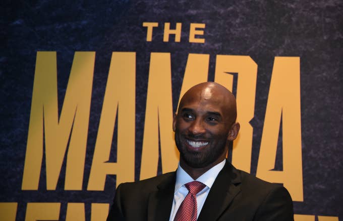 Kobe Bryant poses for a photo during the Mamba Mentality book launch