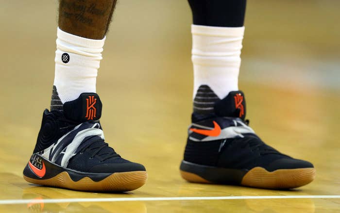Kyrie Irving Wearing a Black/White Orange Gum Nike Kyrie 2 PE Shoes