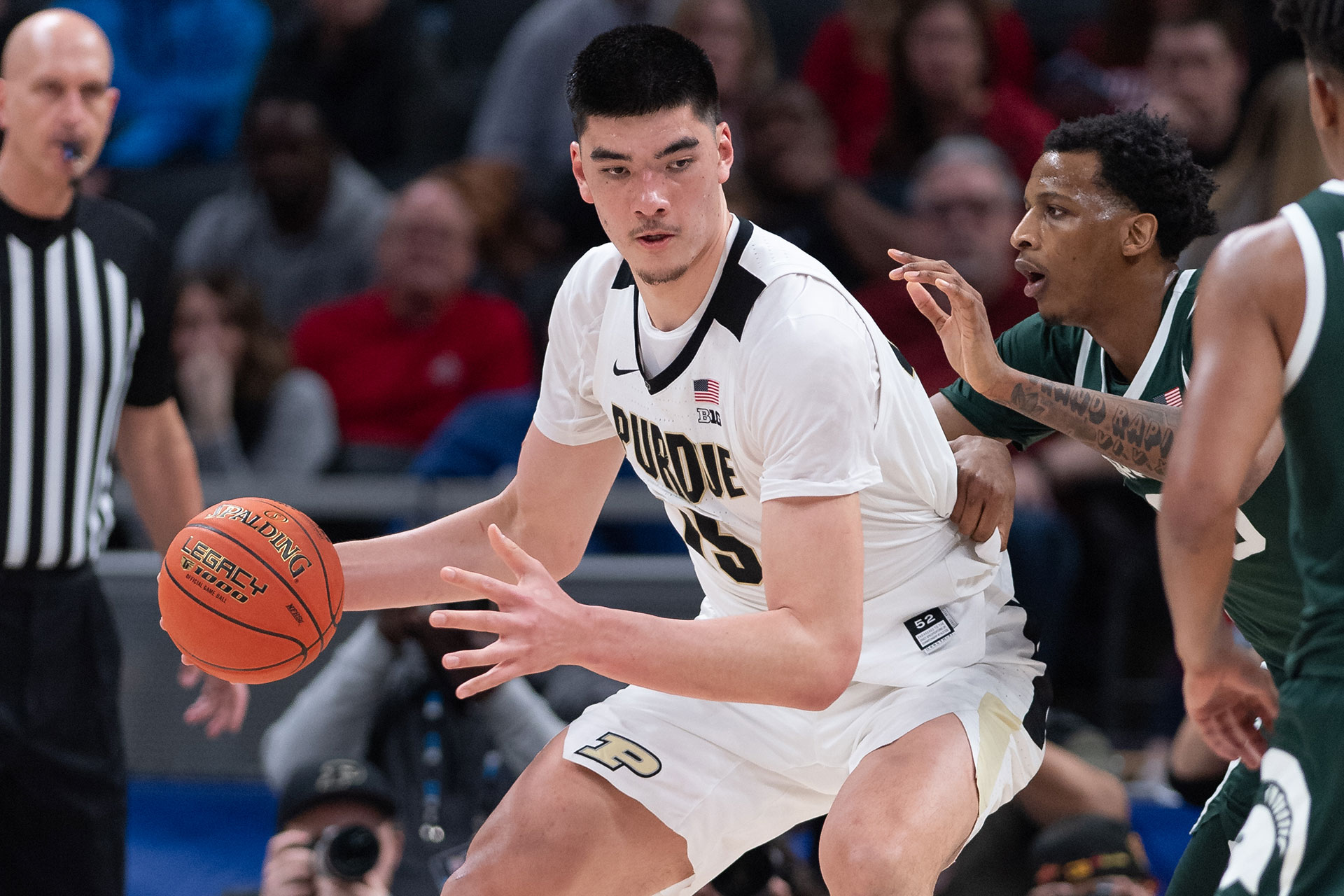 Purdue Boilermakers center Zach Edey (15) backs into the post against Michigan State Spartans forward Marcus Bingham Jr.