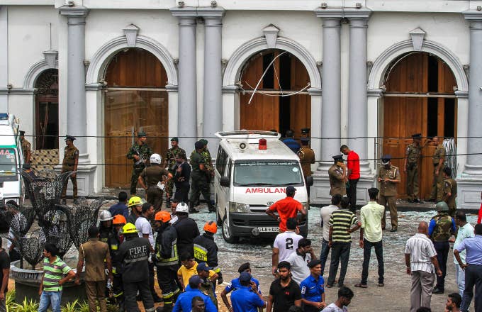 Sri Lankan security forces secure the area around St. Anthony's Shrine
