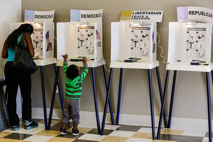 Mother and child at voting booths