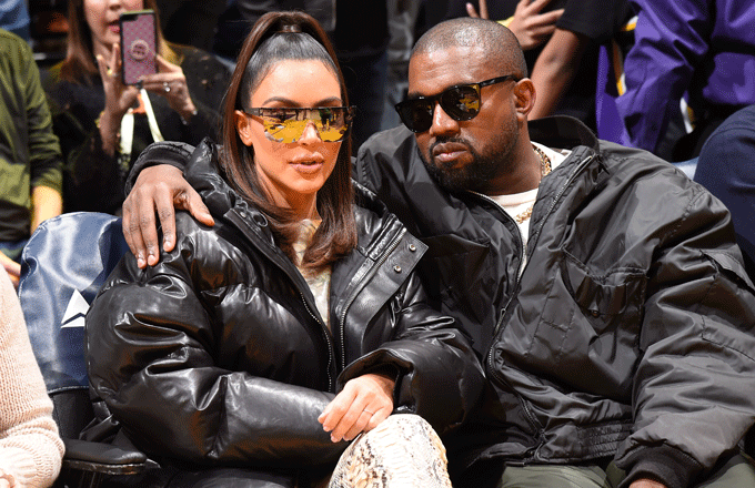 Kim Kardashian and Kanye West take in a Lakers game.