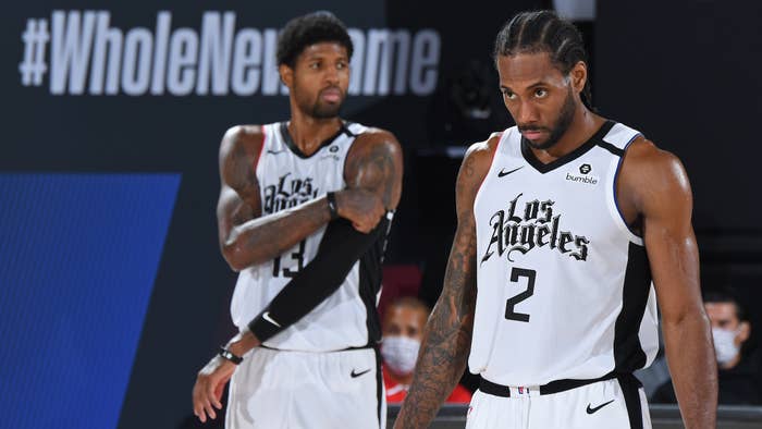 Kawhi Leonard and Paul George seen on court during Game 6 of the Western Conference Semifinals.