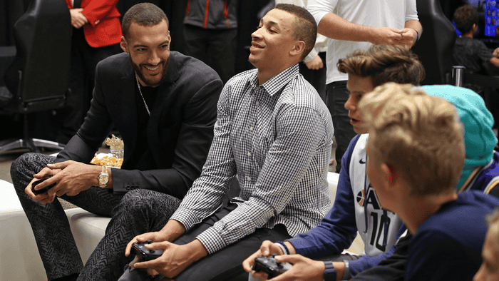 Dante Exum and Rudy Gobert game with some fans.