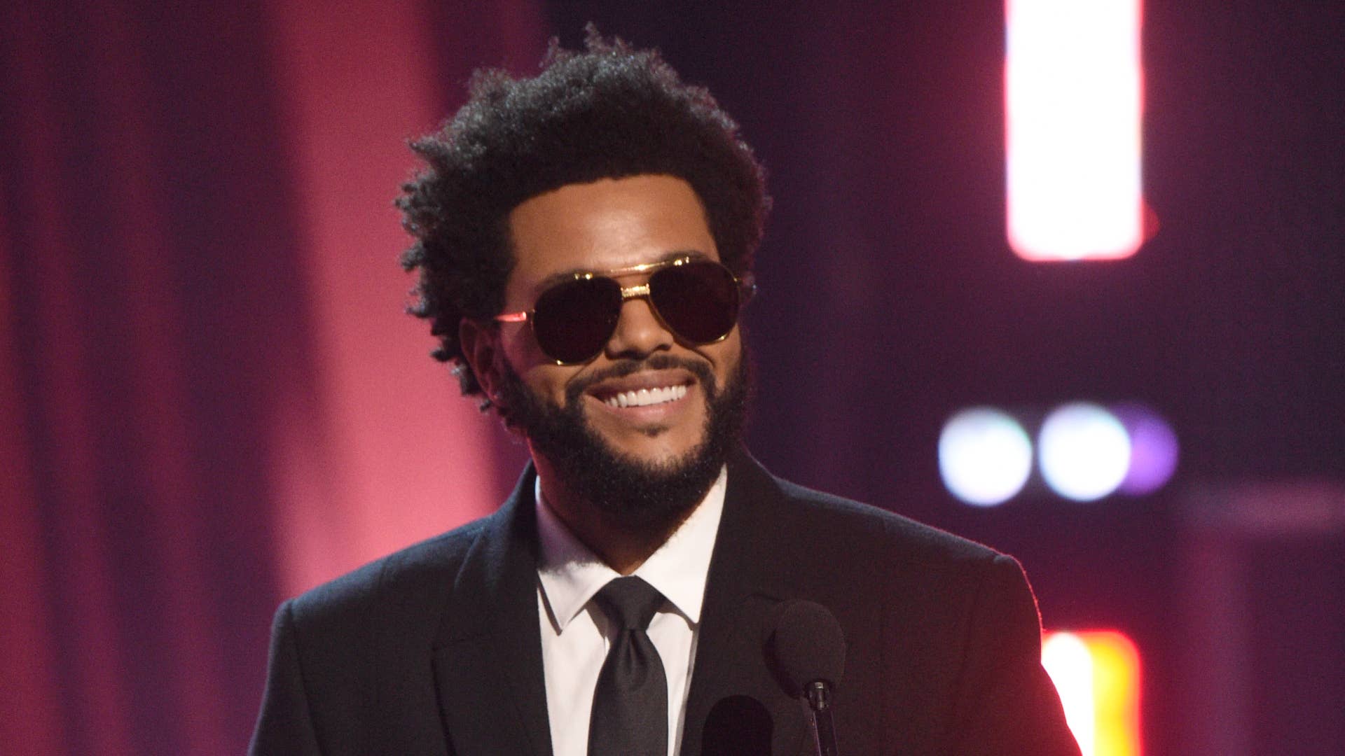 The Weeknd accepts the Male Artist of the Year onstage at the 2021 iHeartRadio Music Awards.