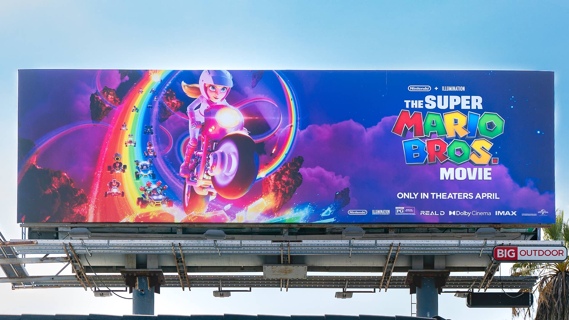 General view of a "Super Mario Bros. Movie" billboard featuring Princess Peach
