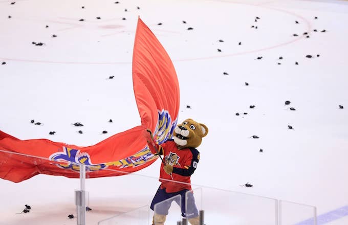 Florida Panthers mascot waves team flag.