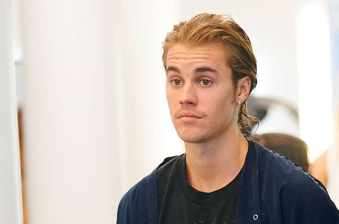 Justin Bieber gets his hair cut at Cutler Salon.