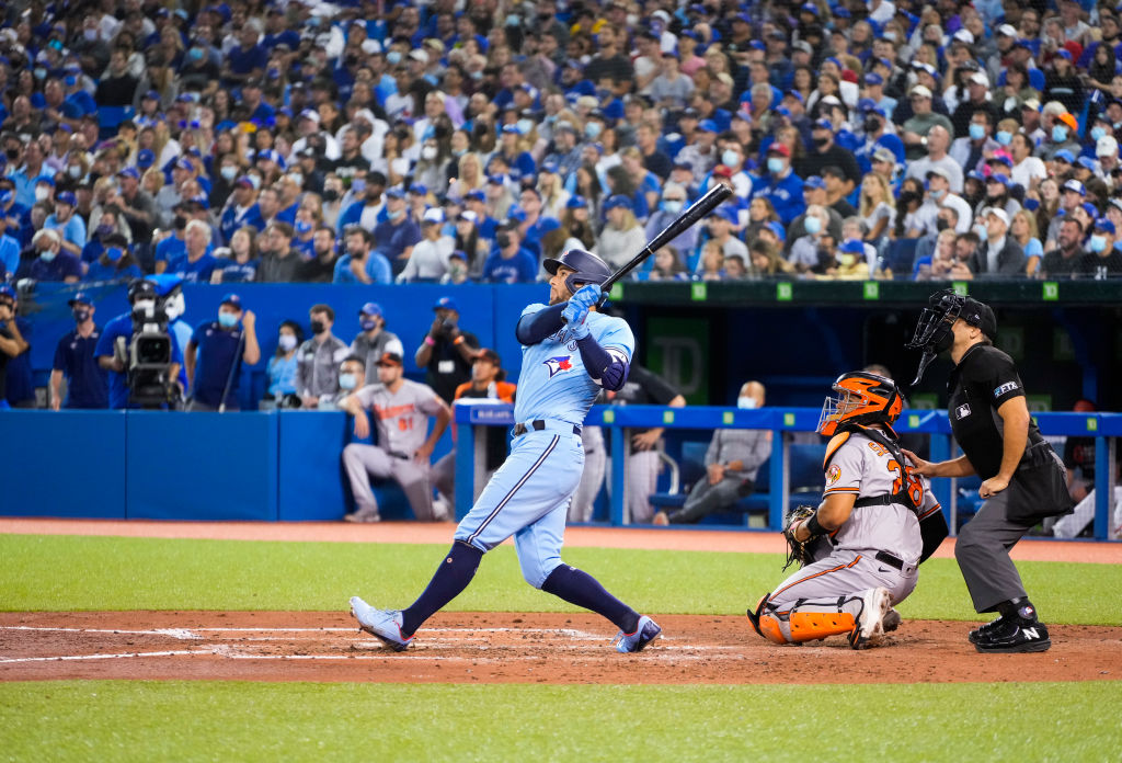 Blue Jay George Springer hitting a home run.