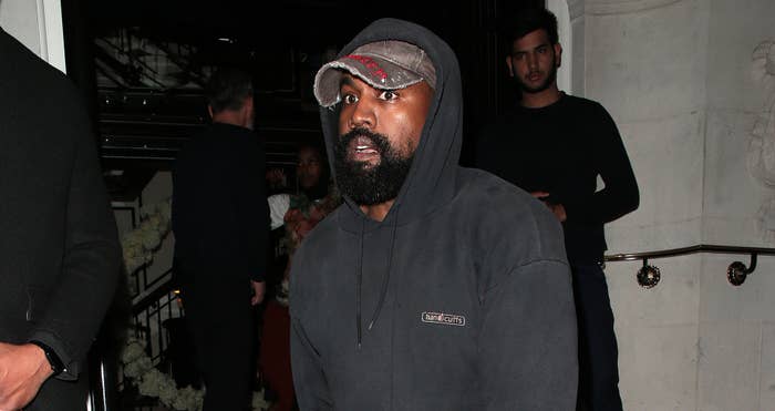 Kanye wearing a hat facing left
