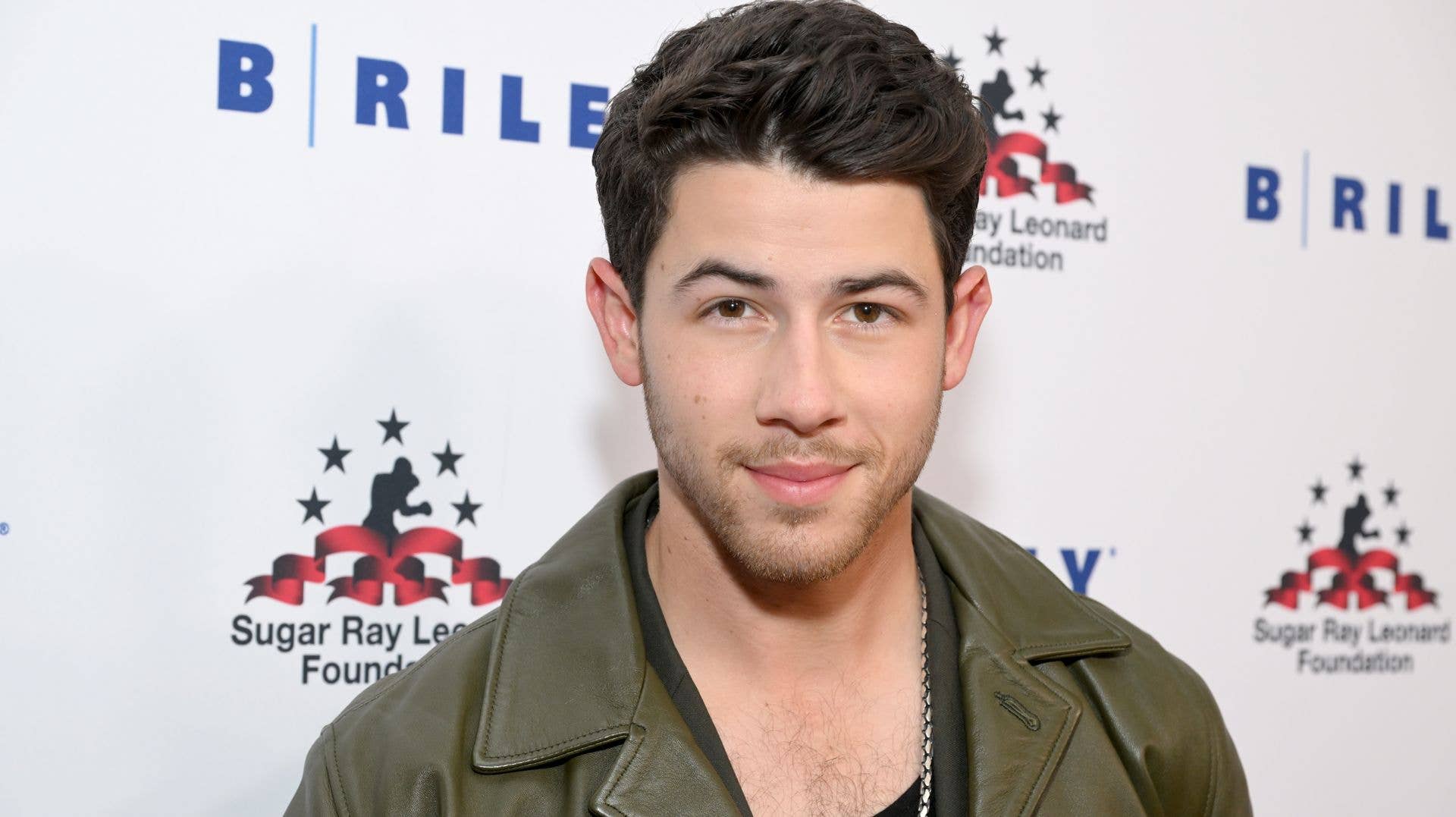 Nick Jonas poses for a photo in 2022