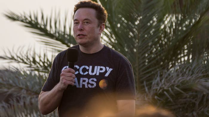 Elon Musk is pictured in a Mar shirt