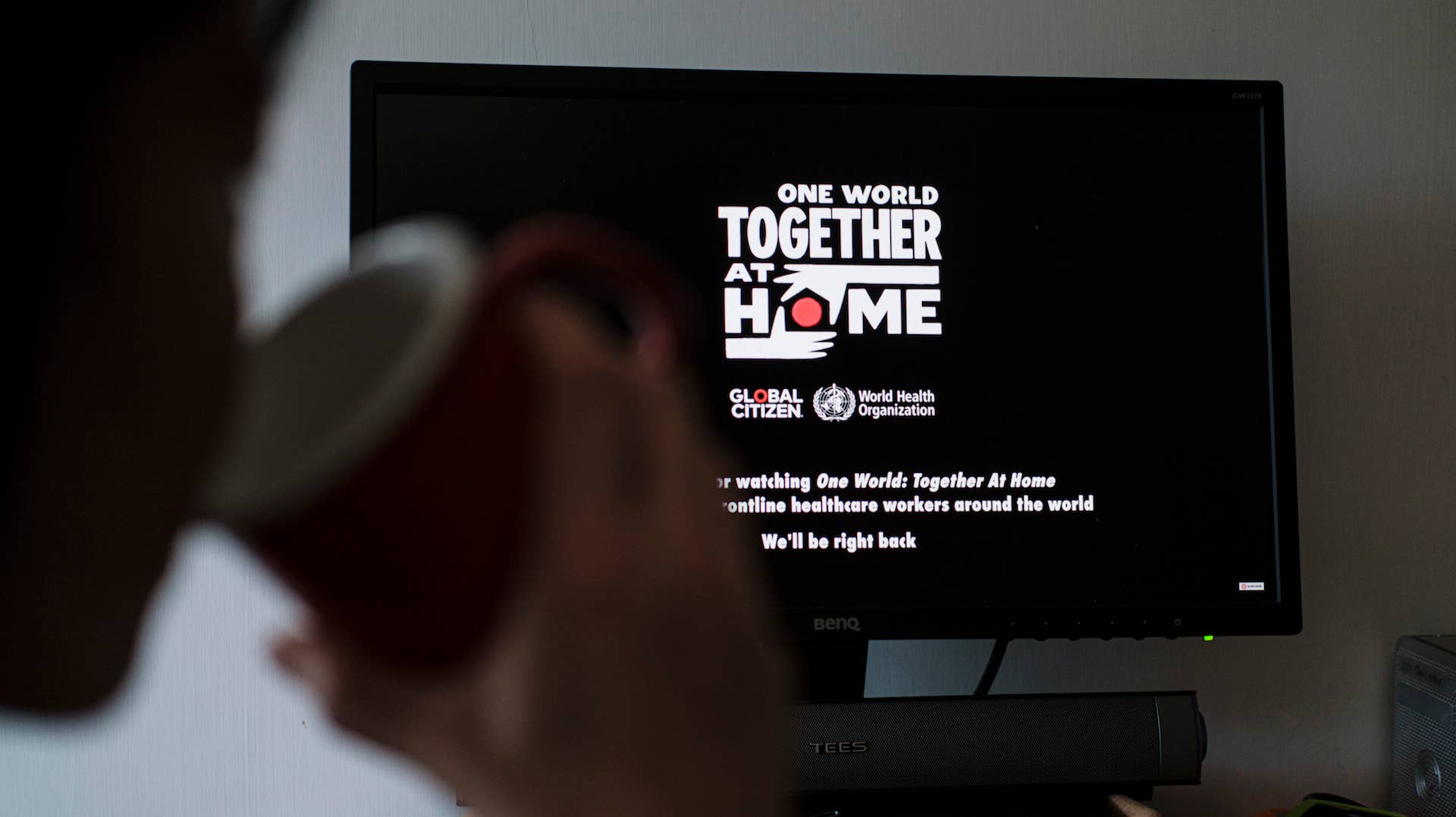 A person watches live streaming of One World Together At Home