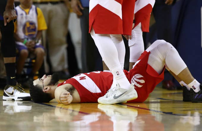Fred VanVleet #23 of the Toronto Raptors reacts after taking an elbow to the forehead