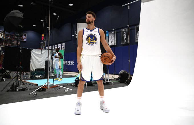 Klay Thompson poses during Warriors media day.