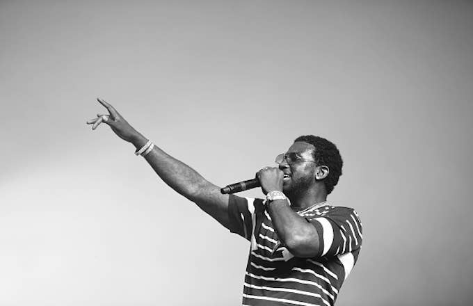 Gucci Mane performs at the Sahara Tent during day 2