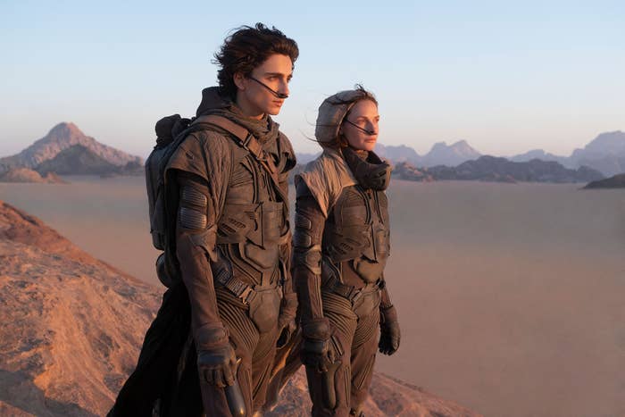 TIMOTHÉE CHALAMET as Paul Atreides and REBECCA FERGUSON as Lady Jessica Atreides in movie Dune